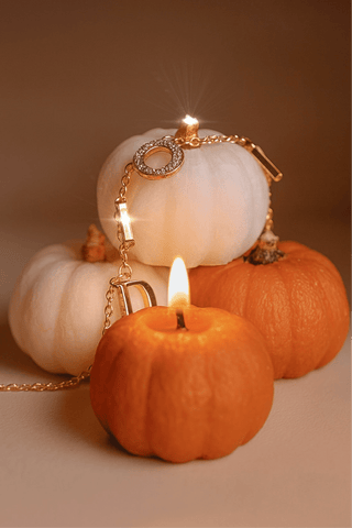 Juego de velas con forma de calabaza otoñal