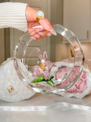 A woman decorating a dining room with the Enchanting Crystal Flower Blossom - XL.