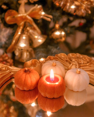 Juego de velas con forma de calabaza otoñal