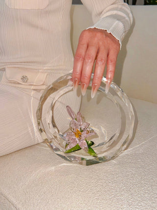 The Enchanting Crystal Flower Blossom - XL perched on a luxurious cloud couch