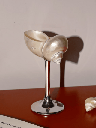 The Seashell Enchanté Cup™️ Set of 2 with a silver stem and base.