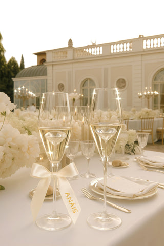 ‘100-Carat’ Diamond Champagne Flute Set of 2™️ featured at a wedding banquet's setup.