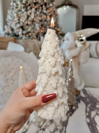 A close up photo of a Holiday Pine Tree Candle.