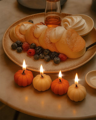 Juego de velas con forma de calabaza otoñal