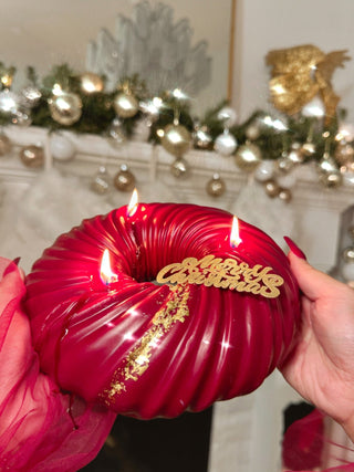 A beautifully lit Anaïs Halo Luxe Candle™️ - Holiday Edition with Real 24K Gold Flakes.