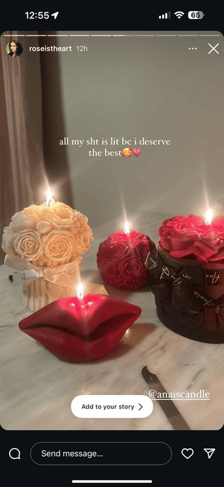 A lit Red Lips Candle.