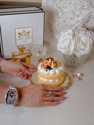 Honey Gold Gâteau Cake Candle beautifully displayed on a luxurious table.
