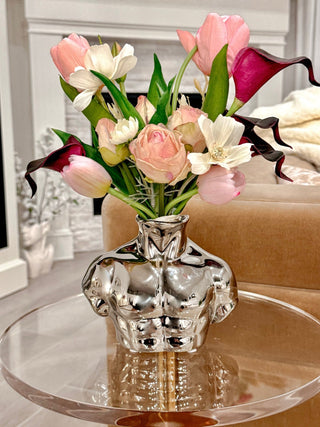 Alexander Male Bust Ceramic Vase - Silver Electroplated on top of a luxurious acrylic side table.