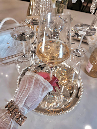 A woman toasting with the Luxurious Crystal Wine Glass Cup in a 5-star hotel.
