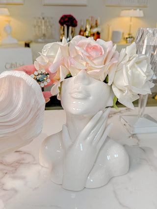 Jovie Ceramic Vase styled with blooming white flowers.