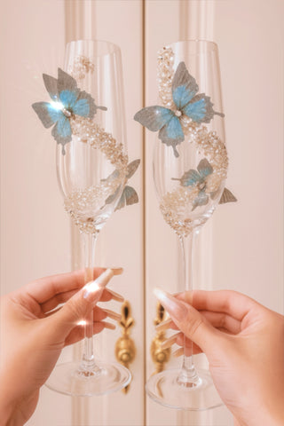 The elegant and classy Butterfly Kisses Crystals Champagne Flute Set.