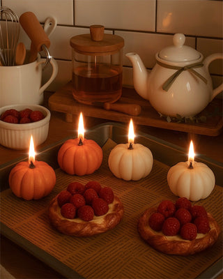 Juego de velas con forma de calabaza otoñal