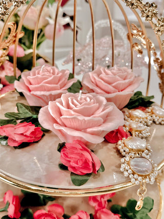 A close up view of the La France Rose Candle Set of 3.