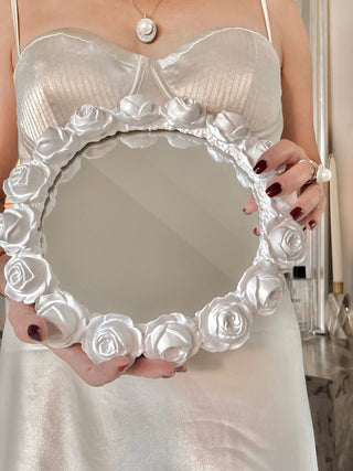 White Roses Mirror Tray featuring a circular, round mirror with white roses all around the edges.