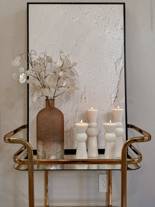 Enzo XXL Pillar Candle Set of 2 in a contemporary living room.