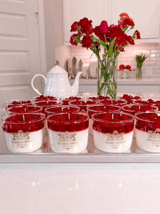 A tray full of Raspberry Mousse Candles handcrafted by Anaïs Candle.