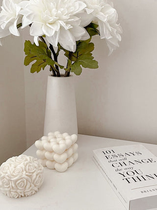“I Heart You” Candle decorated in a neutral gray and white tone dining area.
