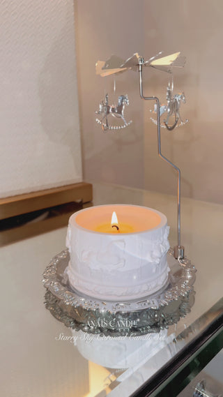 A lit Starry Sky Carousel Candle Set of 3 promotional video.