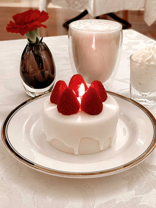 Anaïs Strawberry Shortcake Candle in an upscale restaurant.