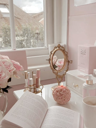 The Flower Romance in French Rose Pink in a luxurious, pink and white-themed bedroom.