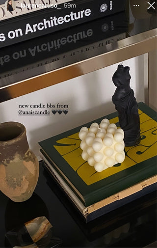 “I Heart You” Candle next to a Venus Candle in Ultra Black.