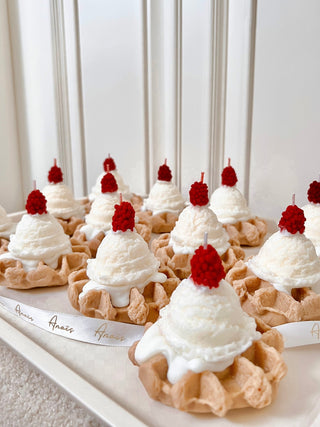 A newly handcrafted batch of Belgian Waffles & Ice Cream candles topped with raspberries.