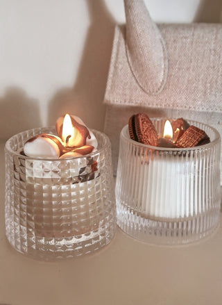Toasted Marshmallow Latte - Limited Edition with lit flames in a cozy living room.