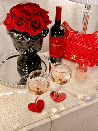 “My Valentine” Wine Glass Cup Set of 2 paired with wine on a credenza.
