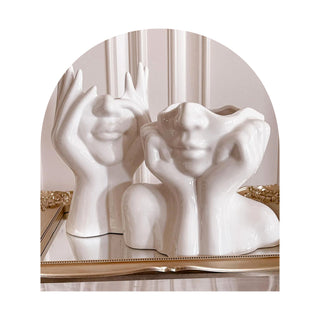 Her & Angelica Vase Set set on top of a vintage mirror.