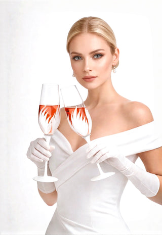 A bride to be toasts with the Feather Bliss Champagne Flute, designed by Anaïs.