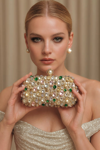 A model poses with the Gemstone Versailles Clutch.