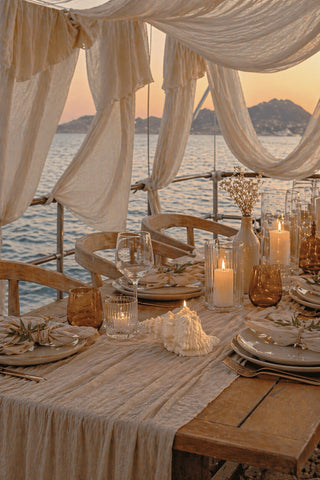 Opaline Conch Seashell Candle - XL in a private oceanfront lounge