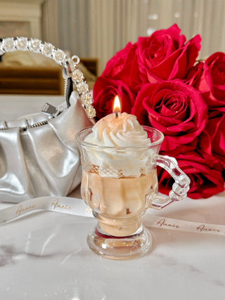 Vanilla Ice Cream Latte Candle atop a luxurious marble table with Anaïs ribbon.