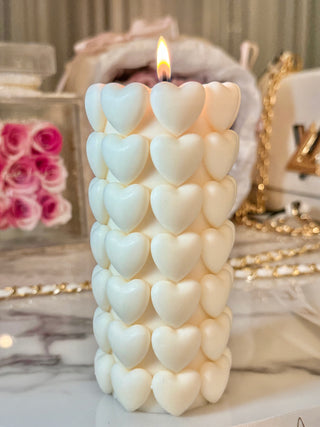 Million Hearts Candle featuring a column of several wax hearts.