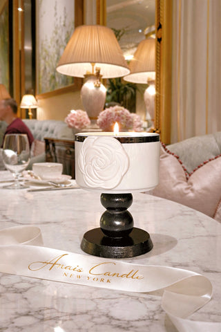 Camélia Maison Candle photographed in a modern luxury mansion.