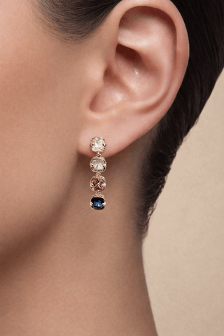 Starlight Prism earrings worn at a high-end hotel cocktail party