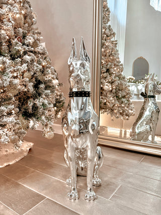 ‘LIMITED & EXCLUSIVE EDITION’ Luxurious Electroplated Doberman Dog Statue in front of grand mirror.