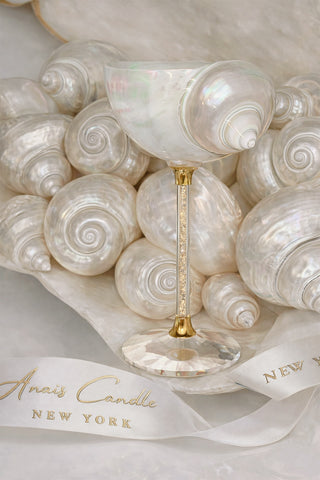 Seashell Enchanté Cup™️ Set of 2 in Gold Crystal on a marble dining table