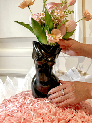 Feminine Ceramic Vase in Black decorated with blooming florals.