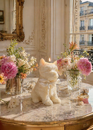 Charming White Terrier Puppy Candle on the dining table of a luxury mansion