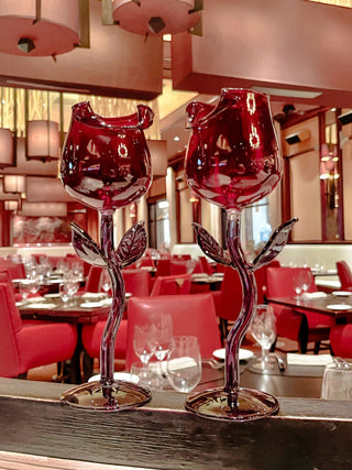Rose for Rose Glass Cup Set of 2 with a backdrop of a high class restaurant with double height ceilings and luxurious dinnerware.