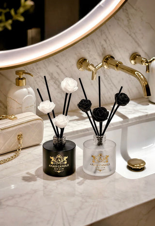 Noir et Ivoire Diffuser Set on a polished stone console in a grand entryway