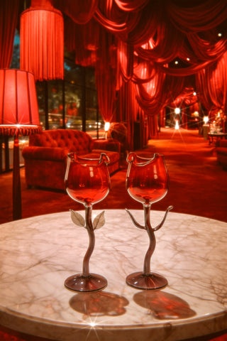 The Rose For Rosé Glass Cup in Red Set of 2 featured in a high end luxurious bar.