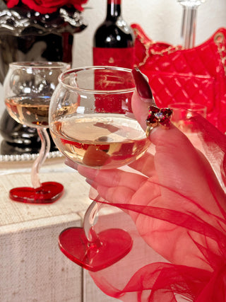 “My Valentine” Wine Glass Cup Set of 2 held by a model.