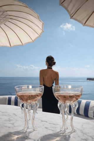 Rainbow Octopus Glass Cup Set of 2 used at an upscale rooftop cocktail party