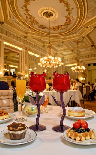 The Rose For Rosé Glass Cup in Red Set of 2 featured in a luxurious hotel breakfast bar.