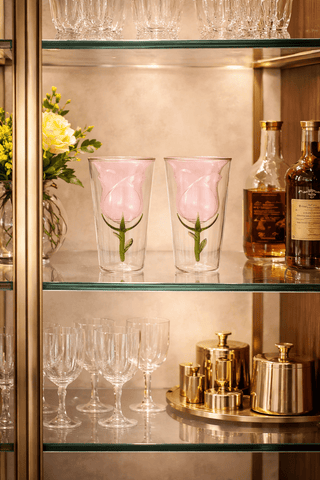 Enchanted Rose Glass Cup Set of 2 displayed on a marble dining table