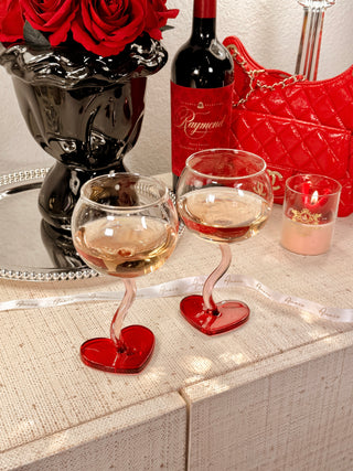 “My Valentine” Wine Glass Cup Set of 2 - Limited Edition atop a luxurious credenza.