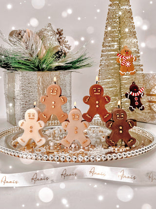 Holiday Gingerbread Friends Candle Crew Set of 5 on a silver tray.