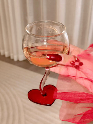 “My Valentine” Wine Glass Cup in front of a luxurious white linen curtain.